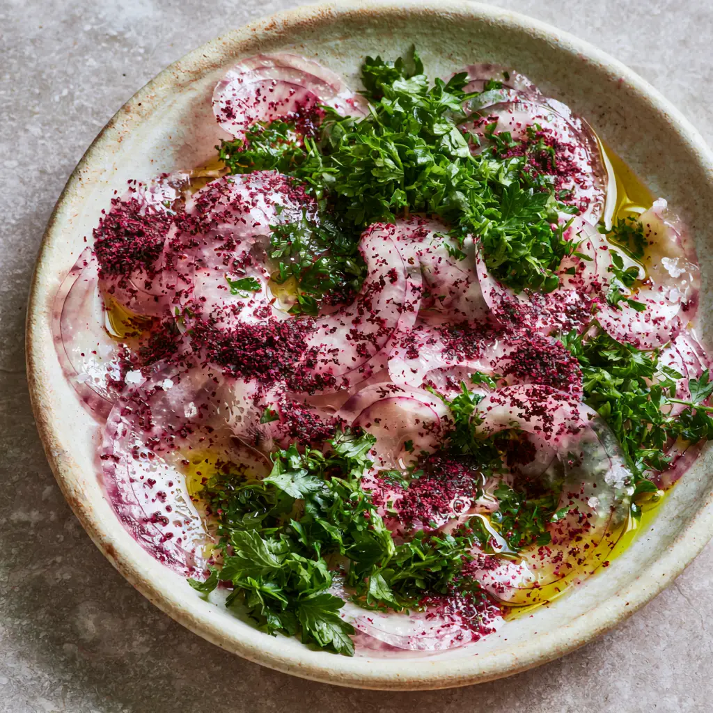 Sumac Onion Salad: The Ultimate Turkish Marinated Onion Recipe 1 Paper-thin red onion crescents mixed with bright parsley and sumac spice. (sumac onion salad)