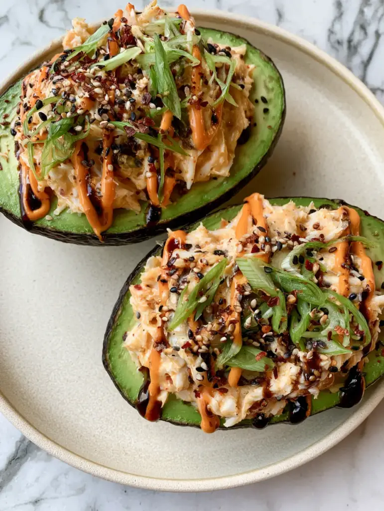 Spicy Crab Stuffed Avocado: The Ultimate High-Protein Umami Lunch 1 Detailed shot of the chunky crab meat and glossy unagi sauce on a stuffed avocado.